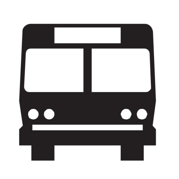 Bus Station. A bus station or bus terminus is located nearby — look for stopping buses and pedestrians.