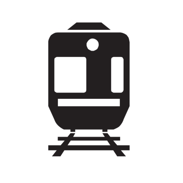 Railway Station. A railway station is located nearby — expect pedestrians crossing and buses stopping.