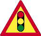Traffic control ahead. A traffic officer is controlling traffic ahead, so slow down and be ready to stop if instructed.