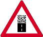 Narrow bridge ahead. A bridge ahead becomes narrower than the road, so slow down and keep your position carefully.