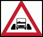 One vehicle width structure. The carriageway ahead narrows so only one vehicle at a time can pass.