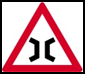 Road narrows from both sides. The road becomes narrower ahead from both sides, so slow down and keep your position carefully.