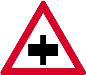 Secondary crossroad ahead. An intersection is ahead where cross-traffic has priority, so approach carefully and be ready to yield.
