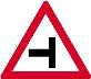 Side road junction from the right. A side road joins from the right ahead, so slow down and watch for traffic entering or crossing.