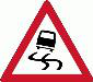 Slippery road ahead. The road surface ahead may be slippery, so reduce speed and avoid sudden steering or braking.