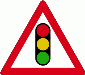 Traffic signals ahead. Traffic lights are ahead, so be ready for vehicles to stop suddenly.
