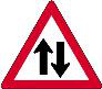 Two-way traffic ahead. The one-way road ahead becomes a two-way road, so watch for oncoming traffic and overtake only when safe.